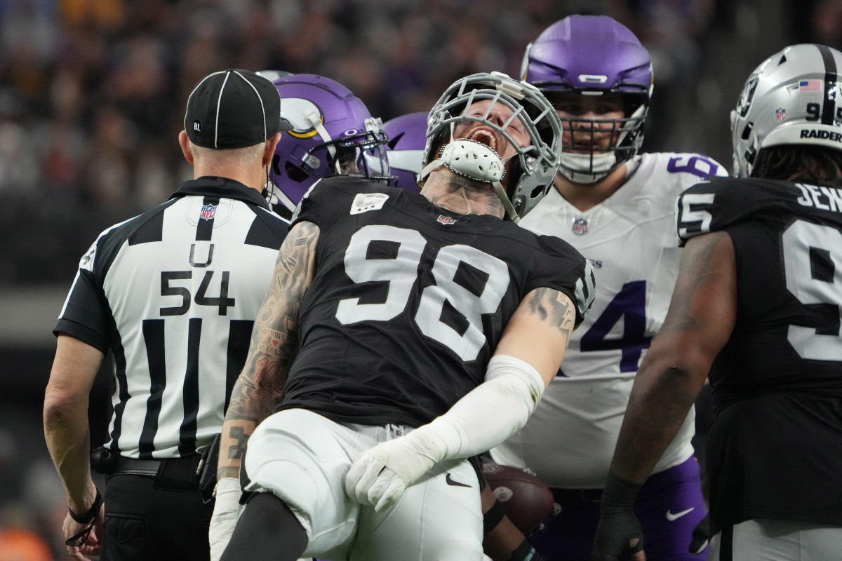 Dec 10, 2023; Paradise, Nevada, USA; Las Vegas Raiders defensive end Maxx Crosby (98) celebrates after a tackle against the Minnesota Vikings in the first half at Allegiant Stadium. Mandatory Credit: Kirby Lee-USA TODAY Sports